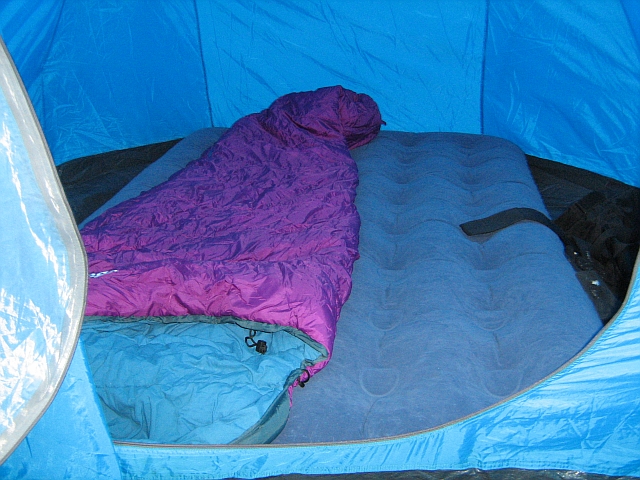 the inside of the sleeping area in my tent, complete with sleeping bag and air bed